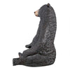 Image of Design Toscano Sitting Pretty Oversized Black Bear Statue with Paw Seat NE867226